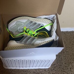 Brand new Adid sneakers with tag and box.